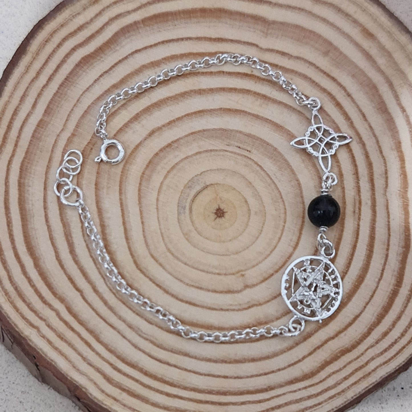 PULSERA PLATA 1 LEY DE TRIPLE PROTECCIÓN (NUDO DE BRUJA,TURMALINA NEGRA Y TETRAGRAMATÓN)