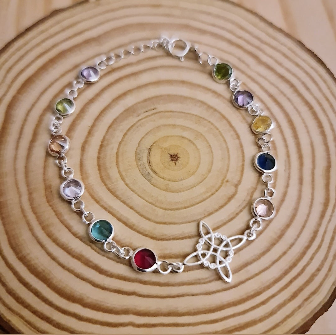 PULSERA PLATA 1° LEY "NUDO DE BRUJA Y CRISTALES"